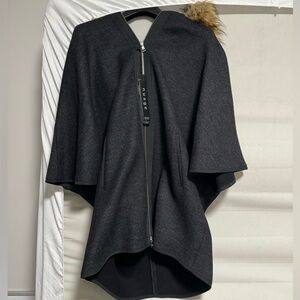 Cape like coat with fur hooded jacket